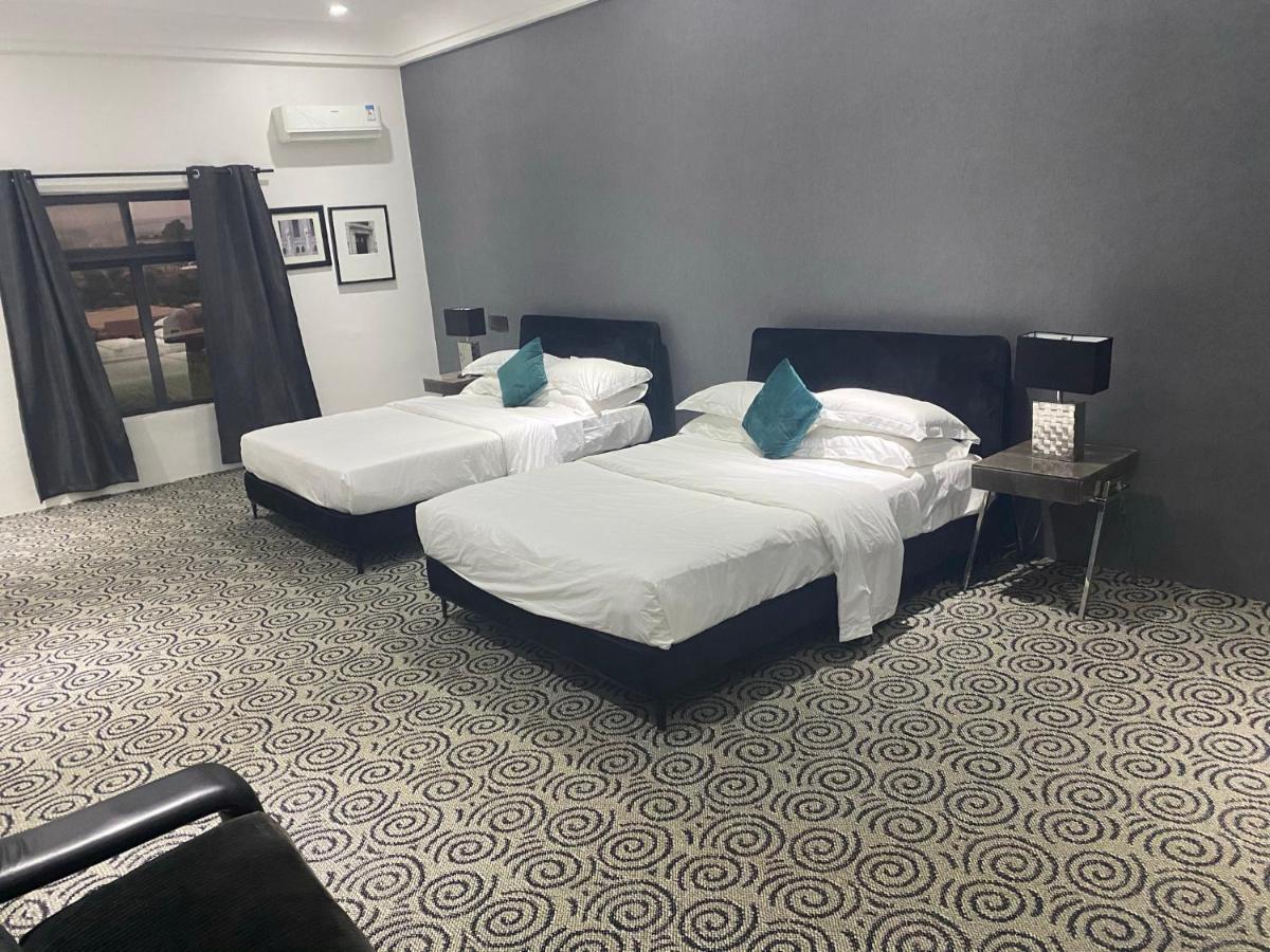 Muse Boutique Hotel Enugu Buitenkant foto
