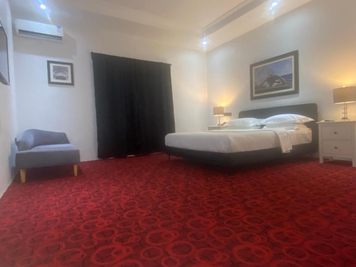 Muse Boutique Hotel Enugu Buitenkant foto