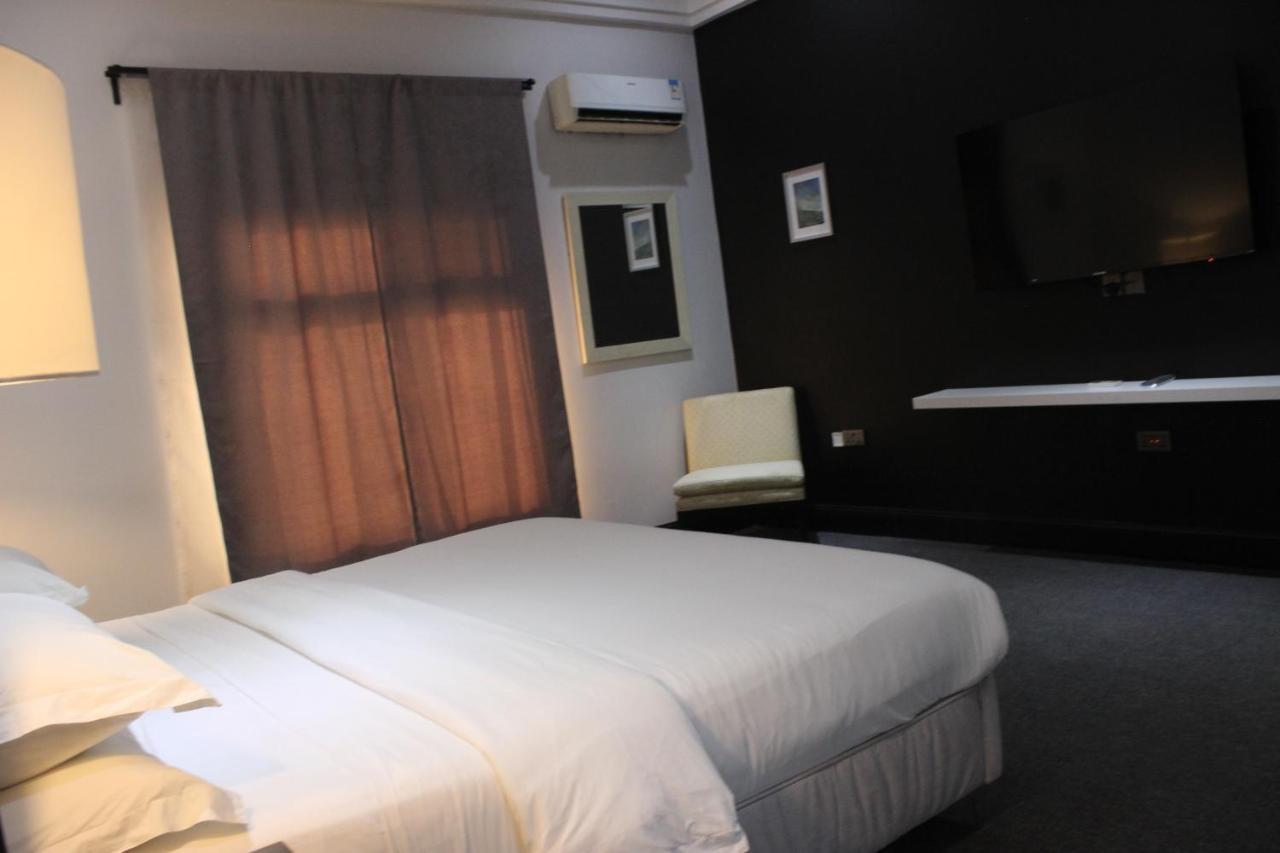 Muse Boutique Hotel Enugu Buitenkant foto
